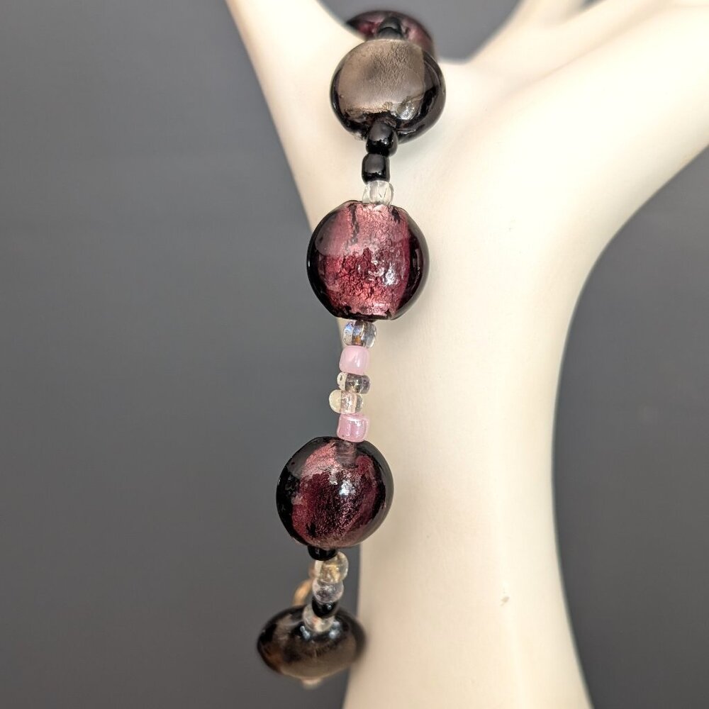 Purple and gray glass beaded bracelet